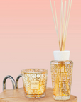 Baobab My First Baobab candle & diffuser from Aurum Gift Set on a table available at Spacio India for luxury home decor collection of Gift Sets of Candles & Fragrance.