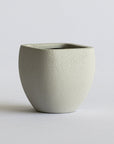 Textured FRP tabletop planter on a light gray background