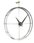 The Nomon Doble O Gold Circle/ A Wenge DOW000D indoor clock features an innovative circular design with a sleek stainless steel finish.