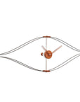 A Nomon Clock Look LON000NN made of metal and wood.