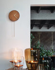 Clock Nomon Swing Gold Walnut SWID