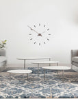 Nomon Spain Tacon T 12 Graphite on a white wall of minimal & modern interior available at Spacio India for luxury home decor collection of Timepieces & Clocks.