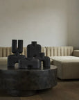 A 101Cph Cobra Double Medio Coffee 211037 coffee table in a living room with a hand glazed couch. (Brand Name: 101 Copenhagen)