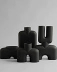 A group of quirky, hand glazed 101Cph Cobra Double Medio Coffee 211037 vases on a white background from the brand 101 Copenhagen.