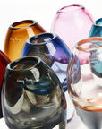Assorted Henry Dean glass vases in vibrant hues including the Jerzy Small Ink Vase – premium decor collection at Spacio India