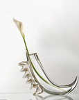 Duccio Di Segna Selene Vase Transparent & Oro – an artistic crystal centerpiece with elegant curves and gold accent fins. A stunning fusion of transparent glass and Italian craftsmanship, available at Spacio India.