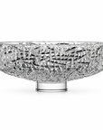 A clear cut crystal bowl with a textured, faceted pattern and a short cylindrical base, photographed on a clean white background.