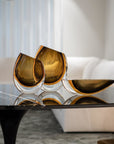 An elegant Gardeco glass vase with Fume Amber.