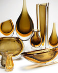 A collection of elegant Gardeco Cance 160 Fume Amber vases and bowls.