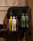 A display of Gardeco Ceramic Sculpture Visitor Plus Yellow Acafrao Clear Cor36 sculptures in an artfully designed interior.