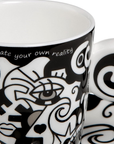 Close look of signature quote of Goebel Two Cup & Saucer set by Billy The Artist available at Spacio India for Luxury Homes of Tableware Collection