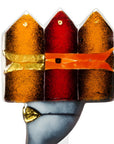 A close-up of a decorative object with three pointed top sections in metallic gold, red, and orange-brown, attached to a gray base with a small gold accent, shown on a plain white background.