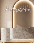 Modern reception desk with Bloome pendant crystal lights