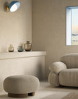 A versatile and vibrant lighting design from the Aurora Collection by Italamp featuring brushed gold accents, white glass diffuser, and retro-inspired finishes. A blue wall lamp in a minimal japandi scandinavian theme interior