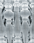 The Italamp Crowns Chandelier, from the Italamp brand, features a stunning row of clear glass rods that illuminate any space with a touch of elegance.