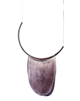 An Italamp Dali pendant necklace with a curved shape hanging on a black background.