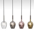 Four pendant lights with different coloured glass shades on a white background from Italamp available at Spacio in India