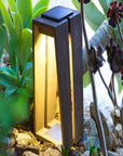 A LJ Solar Lantern SKAAL Tink121 Large 500L Duratek, a Les Jardins solar powered garden light, adds organic charm to an outdoor oasis.