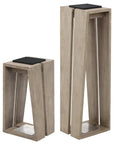 A pair of LJ Solar Lantern SKAAL Tink121 Large 500L Duratek pedestals showcasing organic charm with a black top, perfect for enhancing your outdoor oasis.