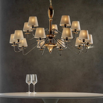 The Lorenzon Divina Chandelier showcases Italian craftsmanship and timeless elegance as it features a glass of wine and a wine glass.