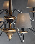 The Lorenzon Divina Chandelier showcases Italian craftsmanship with its metal frame and several shades, exuding timeless elegance.