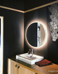 A bathroom with Meystyle Lattice Systems LED Wall Paper with Swarovski walls and a round mirror featuring ambient lighting from Meystyle.