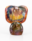 A sculptural elephant god - Ganesh figurine with a glossy, marbled finish featuring swirls of orange, brown, purple, green, and yellow, set against a plain white background.