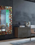 Decorative Murano mirror with colourful circular design in a modern interior setting.