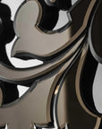 Close-up of ornate Murano mirror design with black and gold colours