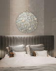 A bedroom with a bed and ambient lighting from a Meystyle Germanium LED Wall Paper with Swarovski.