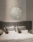 A bedroom with a bed and ambient lighting from a Meystyle Germanium LED Wall Paper with Swarovski.
