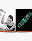 Green emerald jewellery and a princess in black and white with the jewellery. Beyond Extravagance coffee table book by Assouline, featuring the Al Thani Collection of Indian royal jewels and artefacts, spanning 400 years of history.