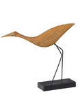 A Warm Nordic Beak Bird Low Heron Oak, designed by Svend Aage Holm-Sørensen, standing on a black base, showcasing Danish design heritage.