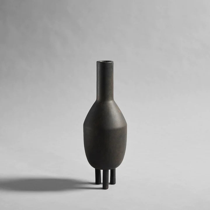 Description: A 101Cph Duck Slim Coffee 111280 vase on a grey background. Brand Name: 101 Copenhagen