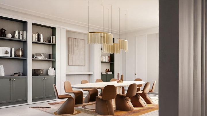 Luxurious dining room featuring the Lustralis modular chandelier by Masiero, available at Spacio retail stores in India - elegant golden chains and soft lighting for refined interiors.