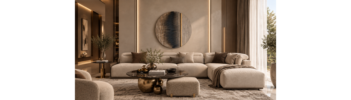 Luxury living room with a statement wall behind the sofa styled with artwork, texture and layered lighting