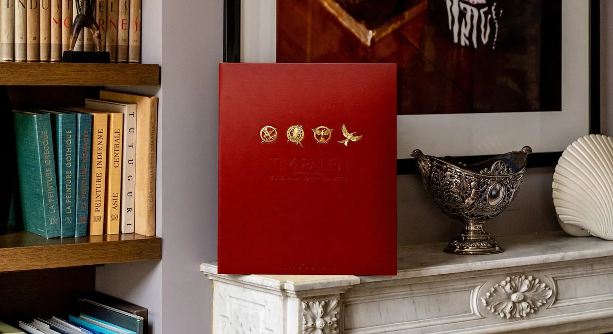 Hunger games book styled on fireplace mantle
