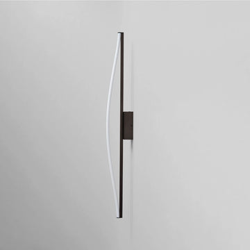 Modern wall light fixture on a gray background by 101 Copenhagen available at Spacio retail stores in Mumbai & Kolkata