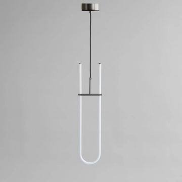 Modern pendant light with a U-shaped design on a gray background