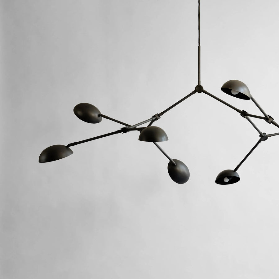 Close up of Drop chandelier Mini in burned black finish from 101 Copenhagen available at Spacio retail stores in Mumbai