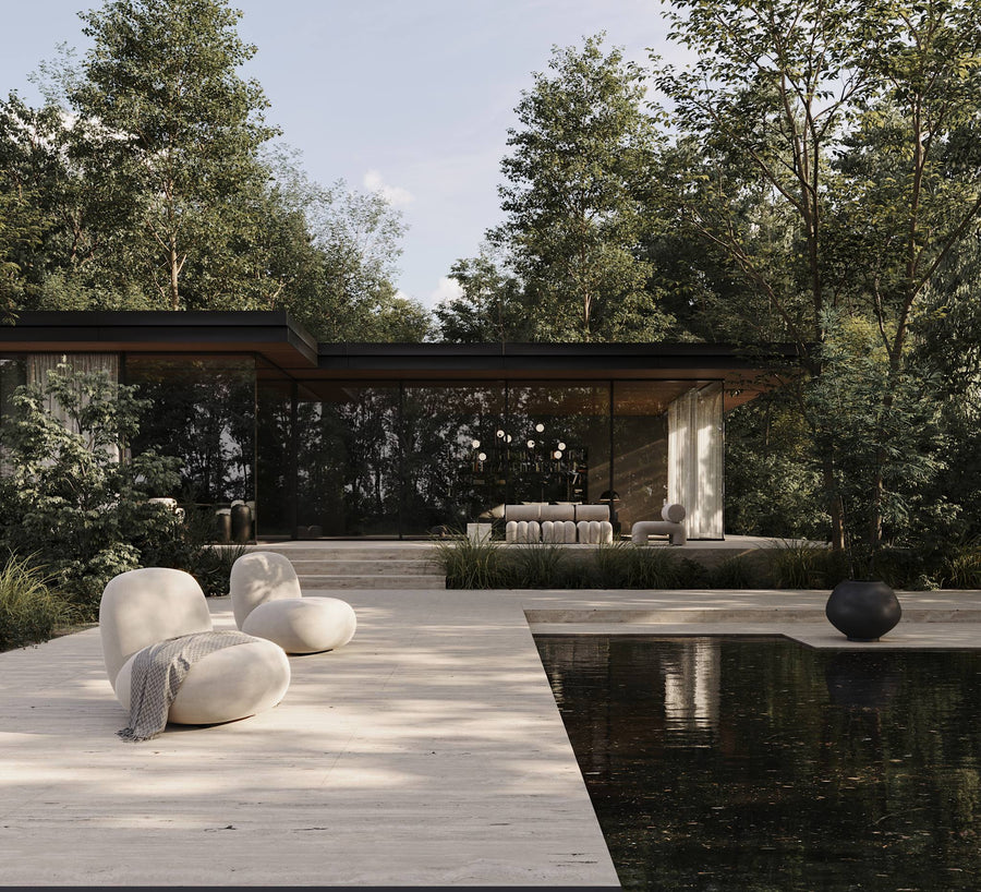 Modern outdoor living space with a pool, lounge chairs, and wooden deck.
