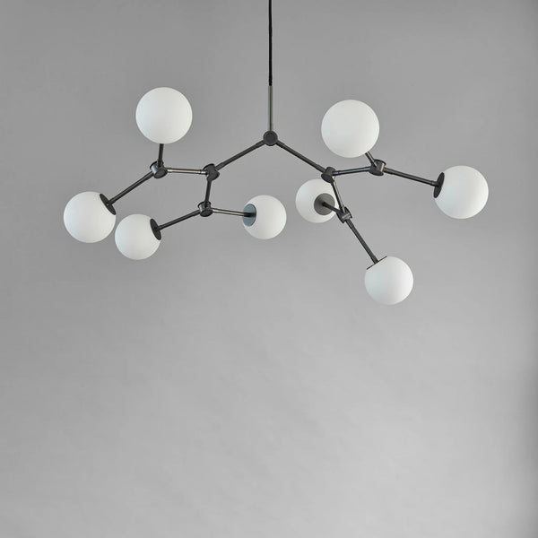 Modern chandelier with white spherical lights on a grey background from 101 Copenhagen available at Spacio retail stores in Mumbai & Kolkat.a 