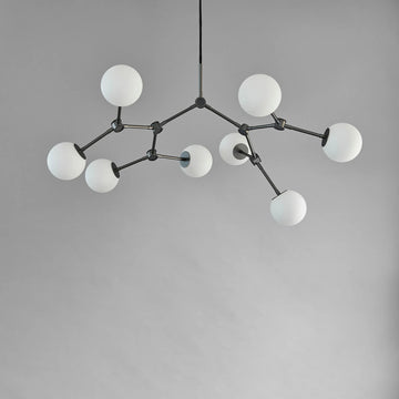 Modern chandelier with white spherical lights on a grey background from 101 Copenhagen available at Spacio retail stores in Mumbai & Kolkat.a 