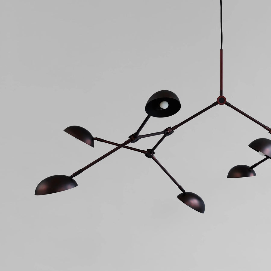Close up of Drop chandelier in burned black finish from 101 Copenhagen available at Spacio retail stores in Mumbai