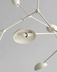 Close up of a white finish Drop chandelier from 101 Copenhagen available at Spacio retail stores in Mumbai & Kolkata. 
