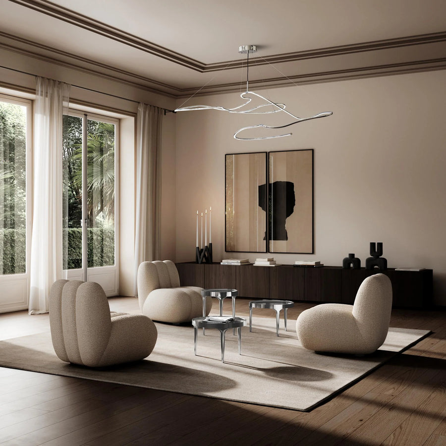 Modern living room with beige walls, large windows, and stylish furniture.