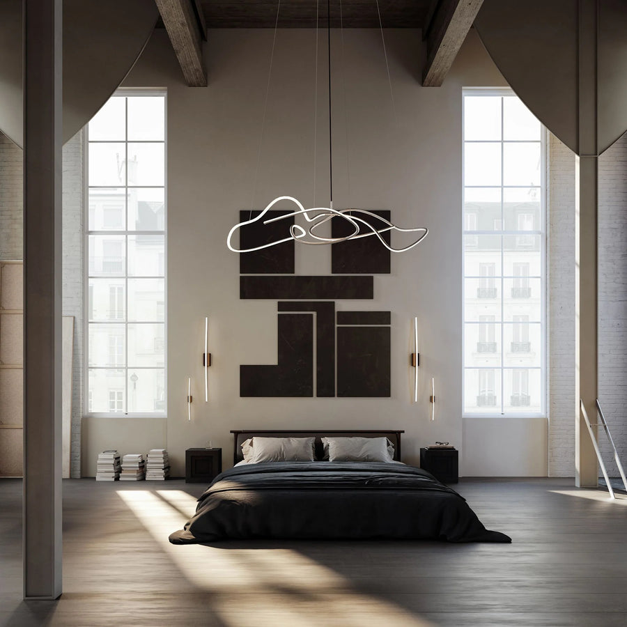 Modern bedroom with a bed, wall art, and large windows.