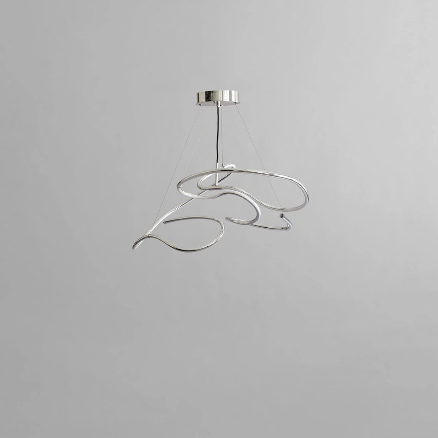 Modern pendant light fixture on a gray background