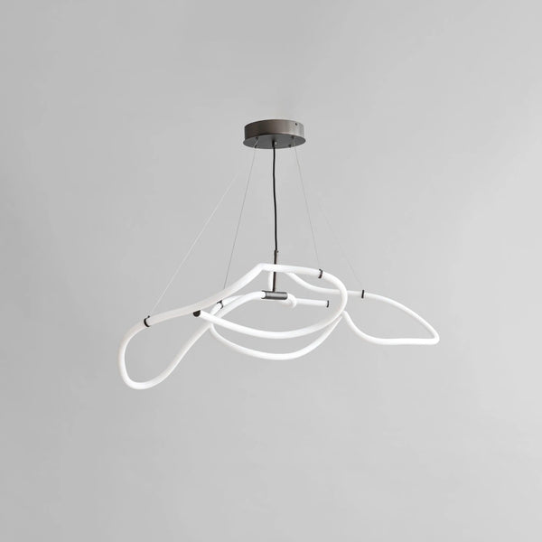 Neon light fixture on a gray background
