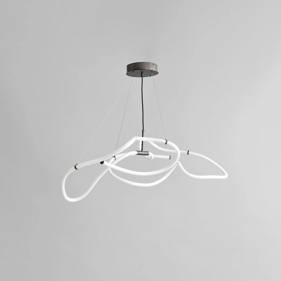 Neon light fixture on a gray background